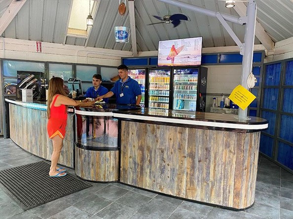 Woman getting a drink at bar