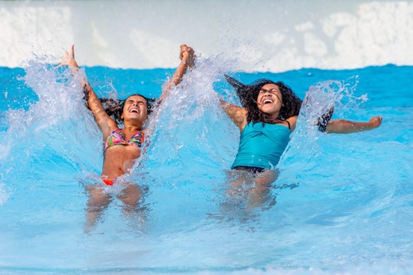 Girls playing in wave pool Splish Splash