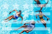 Teenage girl playing in the water