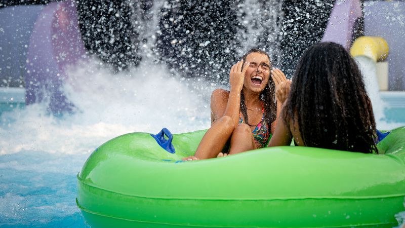 Girls riding in tube